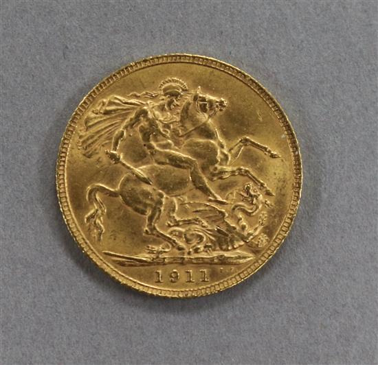 A George V 1911 gold full sovereign.